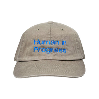 HUMAN IN PROGRESS CAP